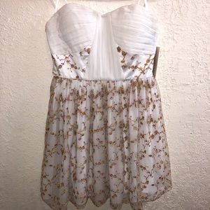 A.Drea white embroidered sweet heart dress.